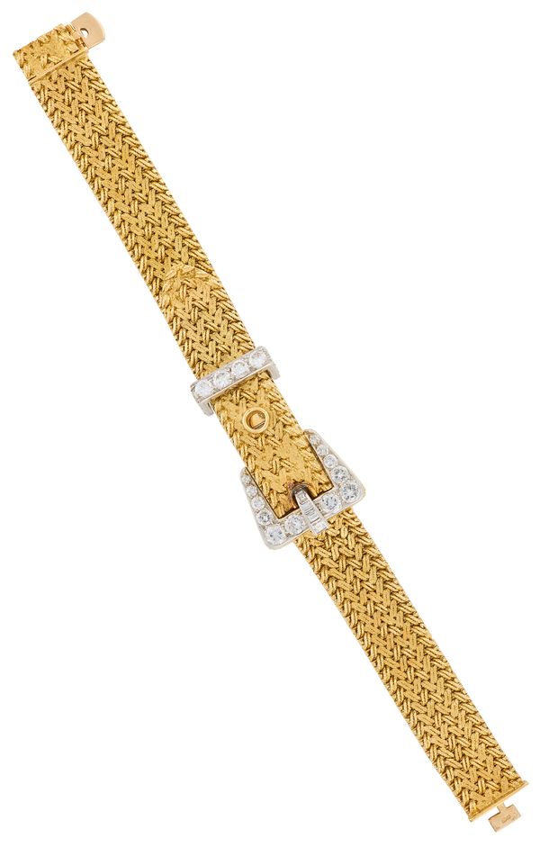 KUTCHINSKY: A VINTAGE DIAMOND BRACELET COCKTAIL WATCH