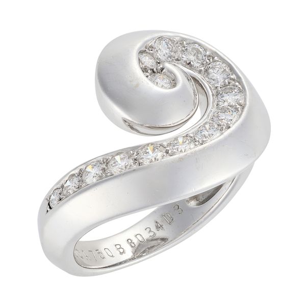 VAN CLEEF & ARPELS: A VINTAGE DIAMOND SWIRL RING