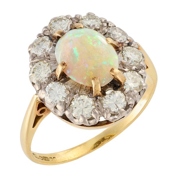 AN OPAL AND DIAMOND CLUSTER RING