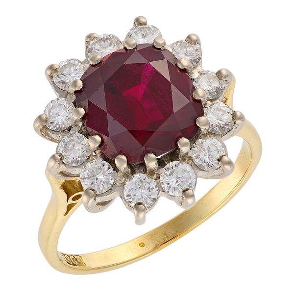 A RUBY AND DIAMOND CLUSTER RING