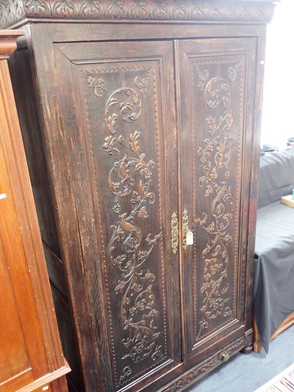 A 19th CENTURY FRENCH PROVINCIAL CHESTNUT ARMOIRE