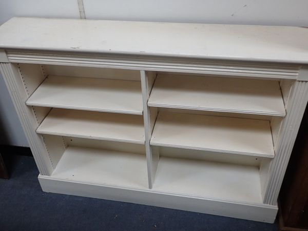 A WHITE PAINTED LOW BOOKCASE