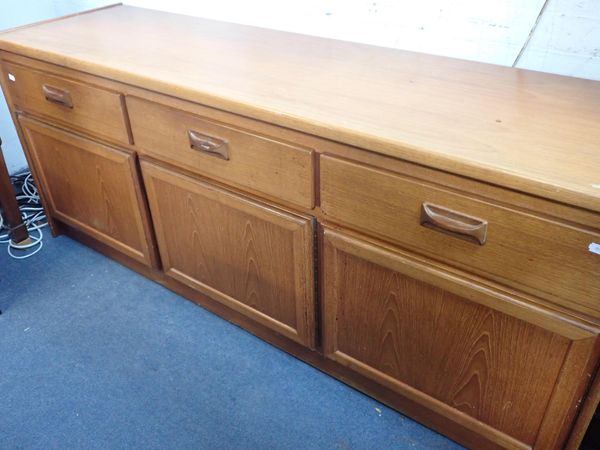 A MID-CENTURY MODERN TEAK SIDEBOARD