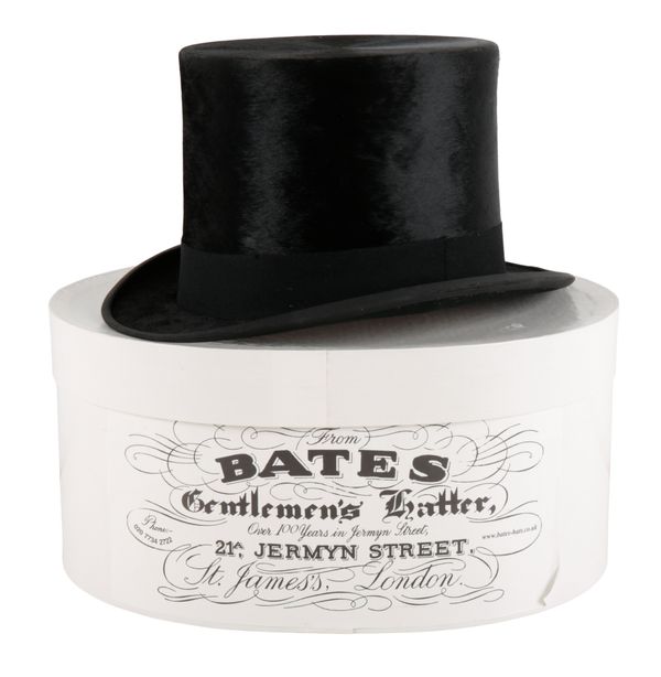 A BLACK SILK TOP HAT BY 'WEST & CO. HATTERS 29 CHEAPSIDE LONDON, E,C. ALSO FOREIGN AGENCIES'