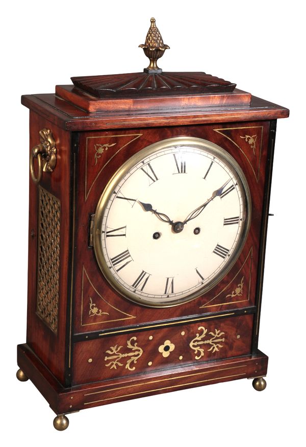 A REGENCY MAHOGANY AND BRASS INLAID BRACKET CLOCK