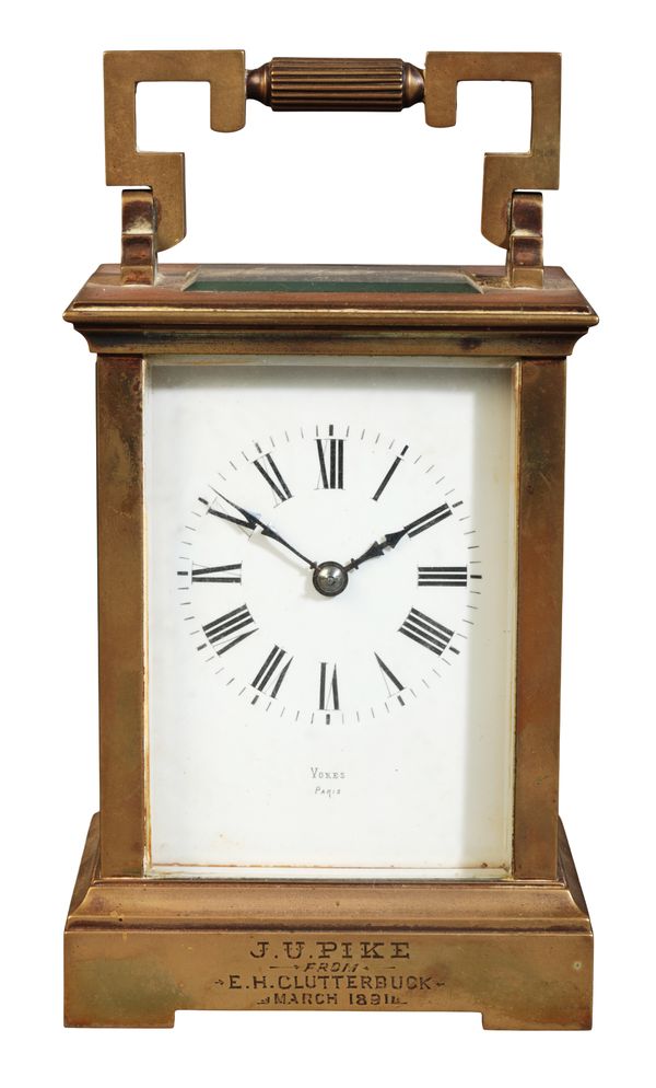 A FRENCH BRASS CARRIAGE CLOCK BY VOKES