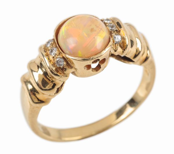 AN OPAL AND DIAMOND DRESS RING