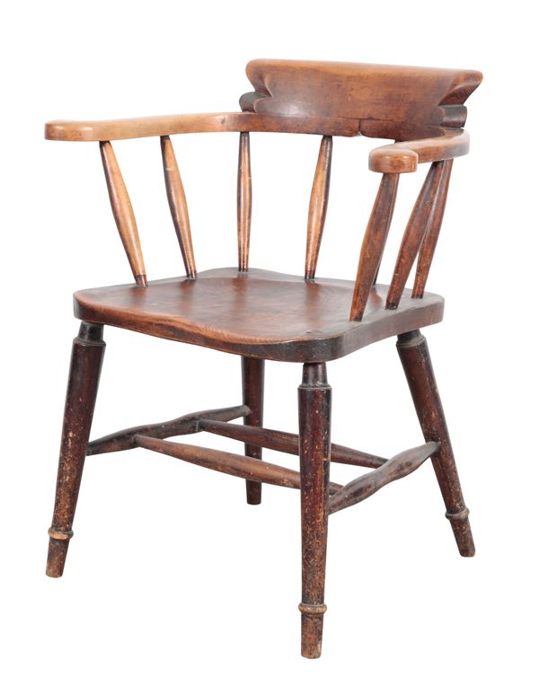 A LATE VICTORIAN SMOKER'S BOW ARMCHAIR