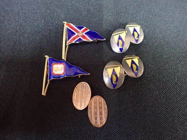 A GOLD SIGNET RING AND  GOLD BACKED ENAMEL PENNANT BADGES