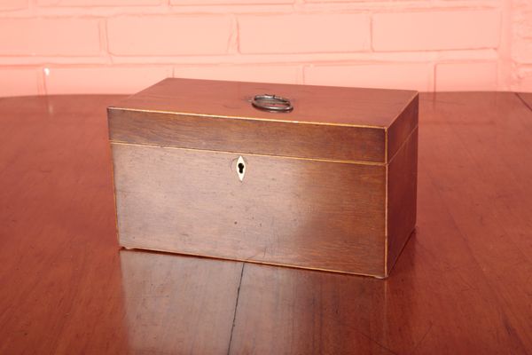 A GEORGE III PARTRIDGE WOOD TEA CADDY