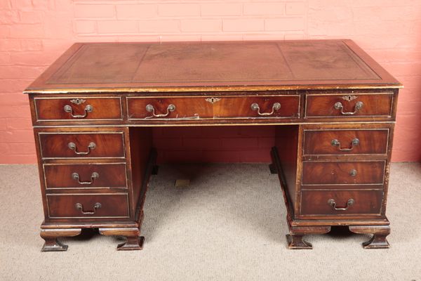 A GEORGE III STYLE MAHOGANY PEDESTAL DESK