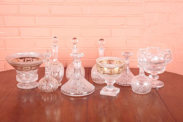 A COLLECTION OF CUT GLASS DECANTERS