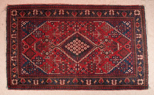 A PERSIAN RUG