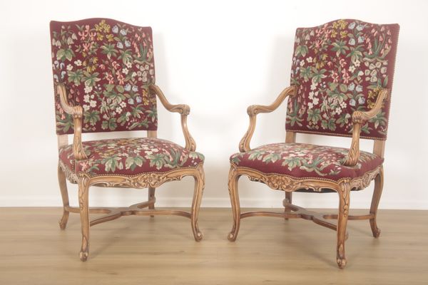 A PAIR OF FRENCH OPEN ARMCHAIRS OR FAUTEILS IN LOUIS XV STYLE