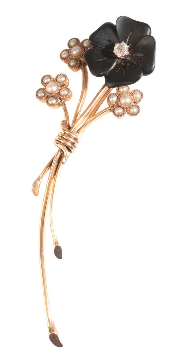 A GEM-SET FLOWER BROOCH