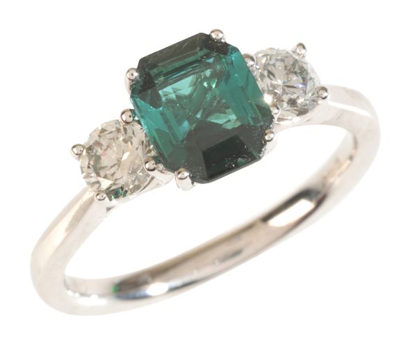 A TOURMALINE AND DIAMOND THREE STONE RING