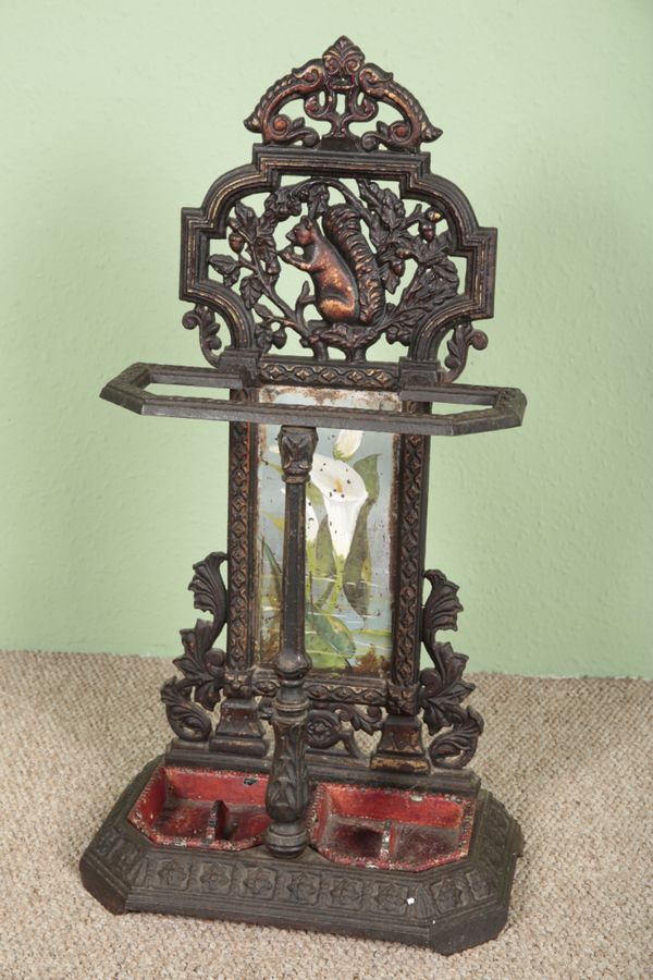 A VICTORIAN CAST IRON TWO DIVISION STICK STAND