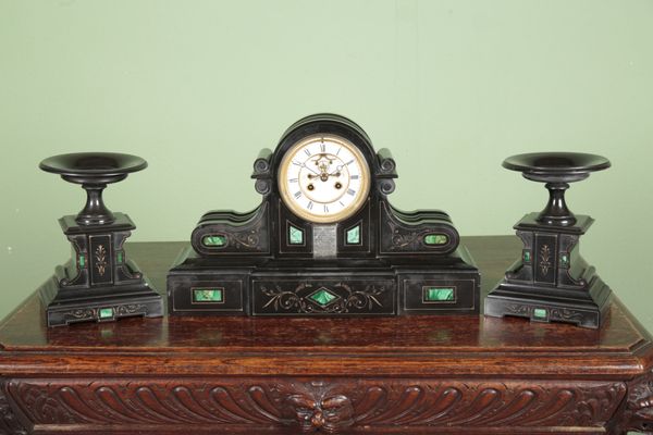 A VICTORIAN SLATE AND MALACITE MANTEL CLOCK AND GARNITURE