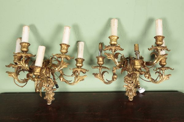 A PAIR OF GILT METAL FIVE BRANCH WALL SCONCES