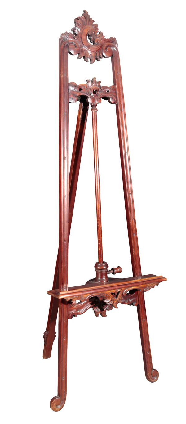 A CARVED MAHOGANY EASEL PICTURE STAND