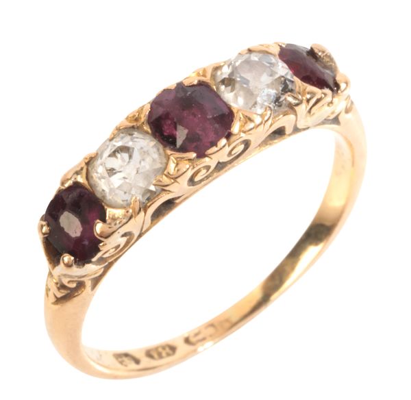 AN ANTIQUE DIAMOND AND RUBY FIVE STONE RING