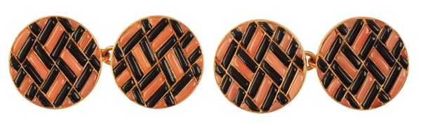 A PAIR OF VINTAGE CARVED ONYX AND CORAL CUFFLINKS