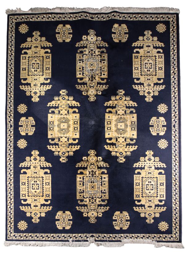 A LARGE PERSIAN CARPET