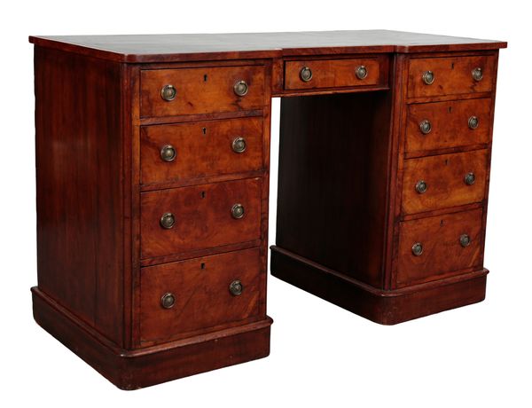 A WALNUT PEDESTAL DESK