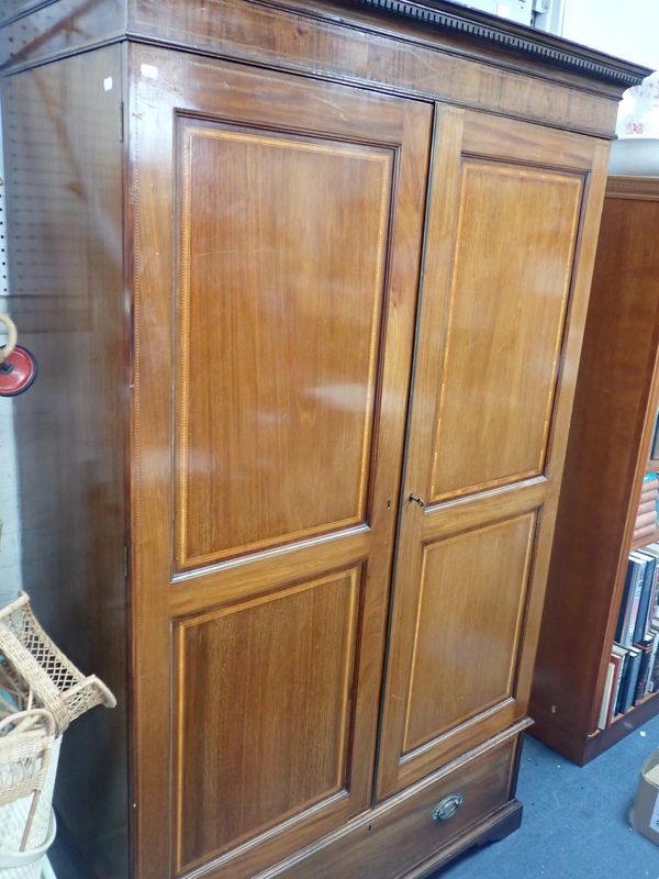 AN EDWARDIAN MAHOGANY WARDROBE