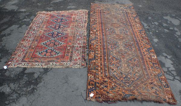 AN ANTIQUE SHIRVAN LONG RUG