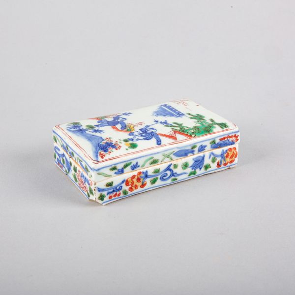 A CHINESE PORCELAIN WUCAI INKSTONE AND COVER