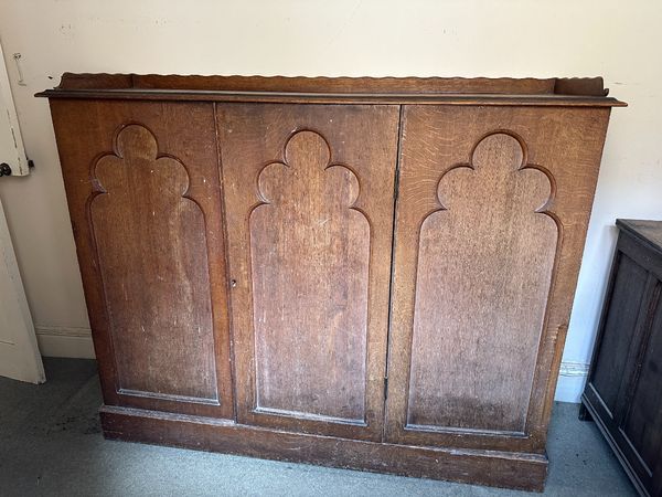 A VICTORIAN OAK SIDEBOARD
