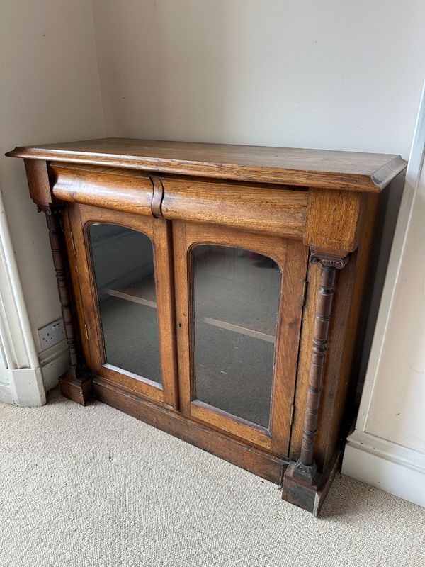 A VICTORIAN OAK BOOKCASE