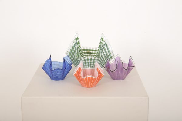 CHANCE GLASS: FOUR PRINTED GLASS HANDKERCHIEF VASES