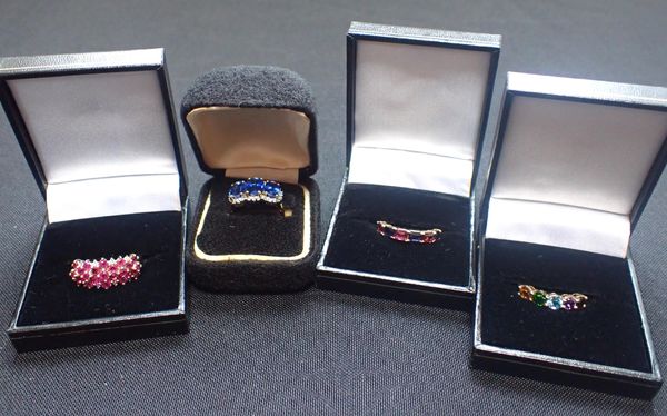 FOUR 9ct GOLD DRESS RINGS