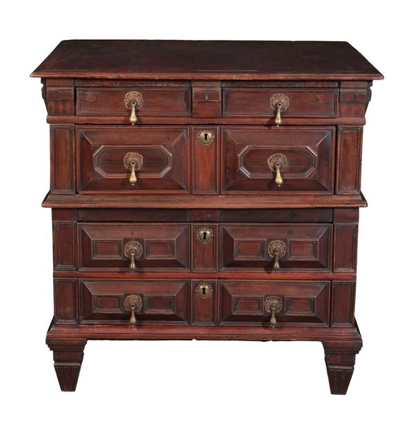 A CHARLES II OAK AND WALNUT CHEST OF DRAWERS