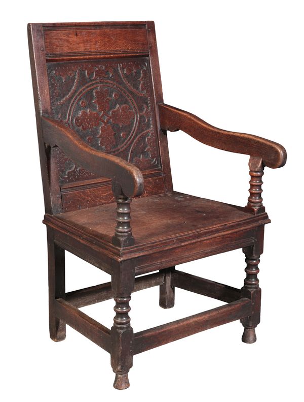 AN OAK WAINSCOT ARMCHAIR