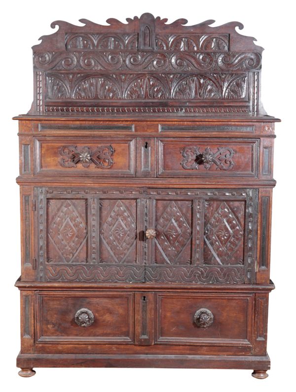 AN OAK CUPBOARD