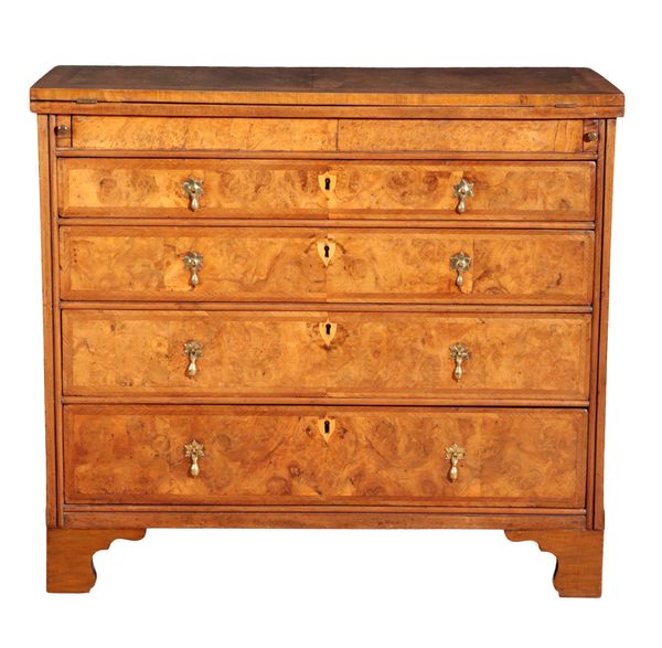 A WALNUT BACHELORS CHEST OF DRAWERS