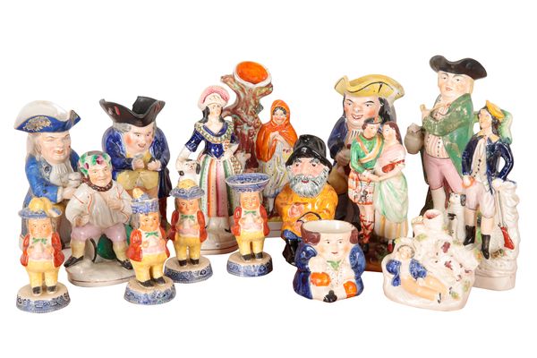 AN EARLY 19TH CENTURY ENGLISH POTTERY ‘TOBY’ CRUET SERVICE