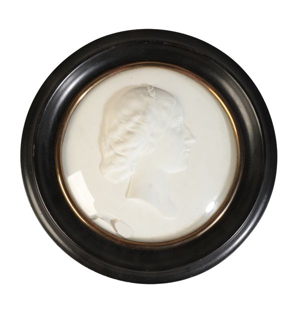 A SÈVRES BISCUIT PORCELAIN CIRCULAR PLAQUE