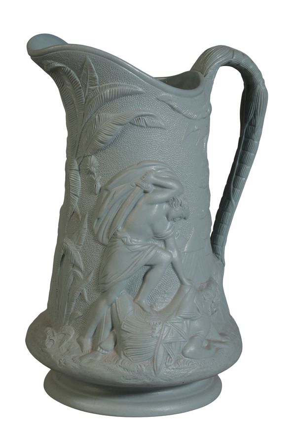 A THOMAS TILL & SONS PALE GREEN POTTERY ‘DAVID AND GOLIATH’ JUG