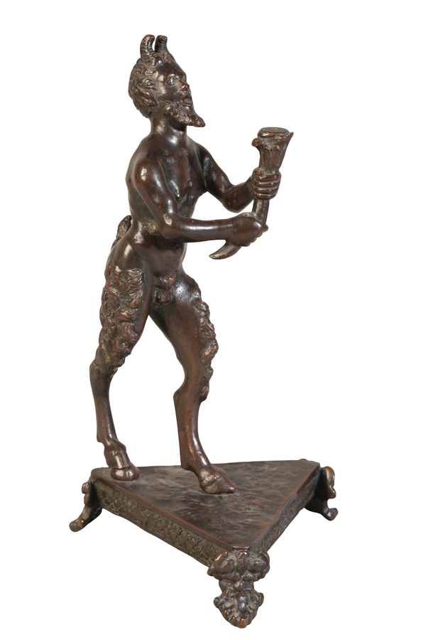 ATTRIBUTED TO THE WORKSHOP OF DESIDERIO DA FIRENZE (active 1532-1545) AN ITALIAN BRONZE FIGURE OF A FAUN