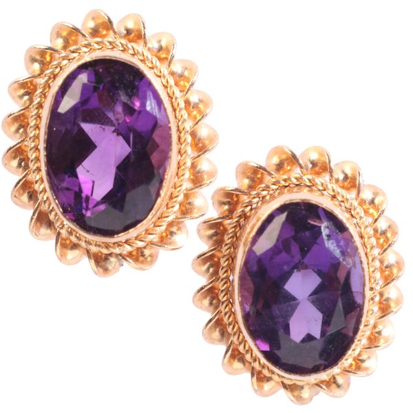 A PAIR OF AMETHYST STUD EARRINGS