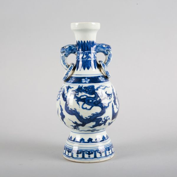 A CHINESE PORCELAIN BLUE AND WHITE PEAR SHAPED VASE