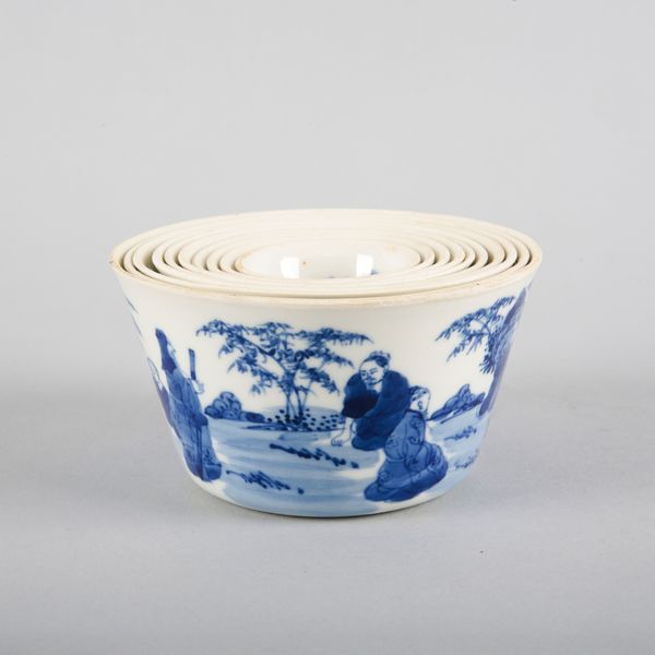 A SET OF TEN CHINESE PORCELAIN BLUE AND WHITE STACKING BOWLS