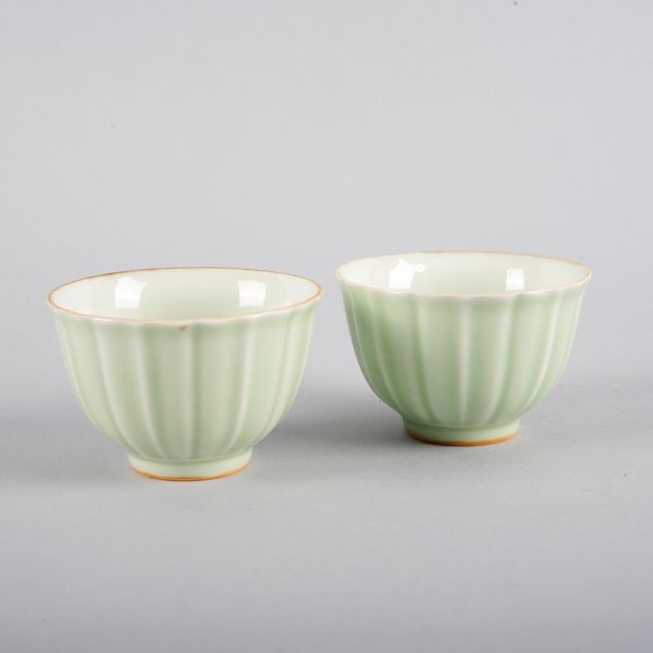 A PAIR OF CHINESE PORCELAIN CELADON GLAZED CUPS
