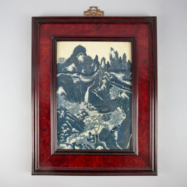 A CHINESE PORCELAIN BLUE AND WHITE PLAQUE