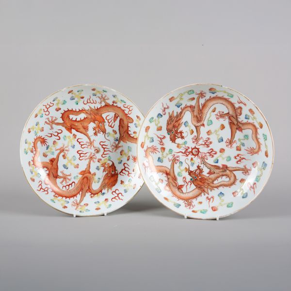 A NEAR PAIR OF CHINESE PORCELAIN IRON RED 'DRAGON' PLATES