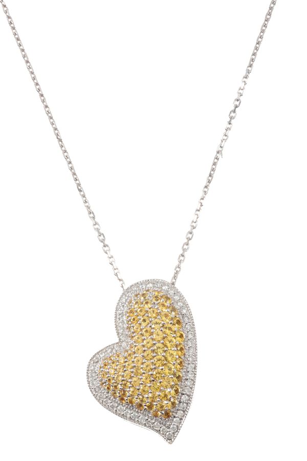 A YELLOW AND WHITE DIAMOND PENDANT AND CHAIN